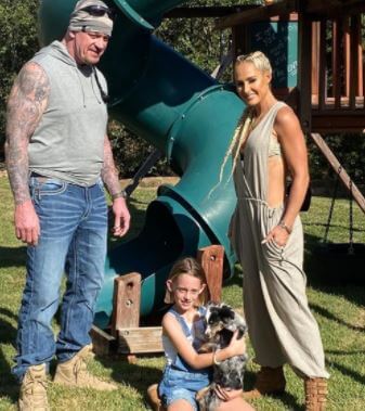 Chasey Calaway father The Undertaker with wife Michelle and daughter Kaia.